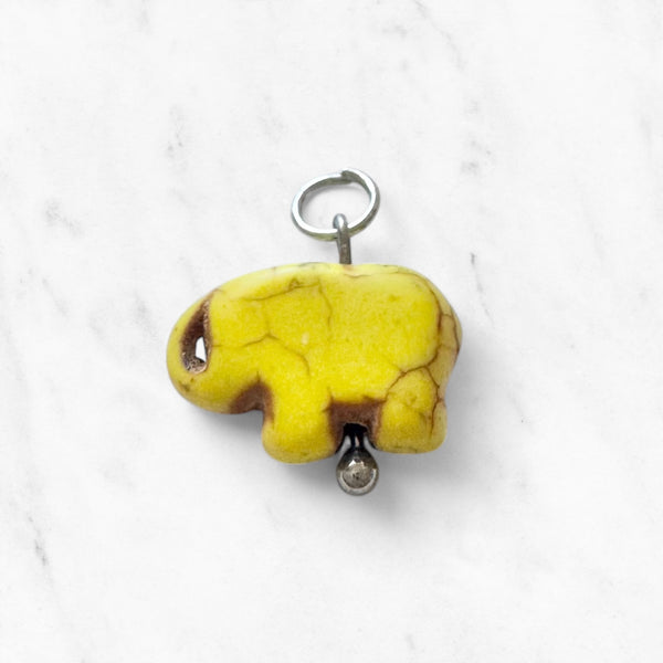 "Elephant Mustard Silver STC"